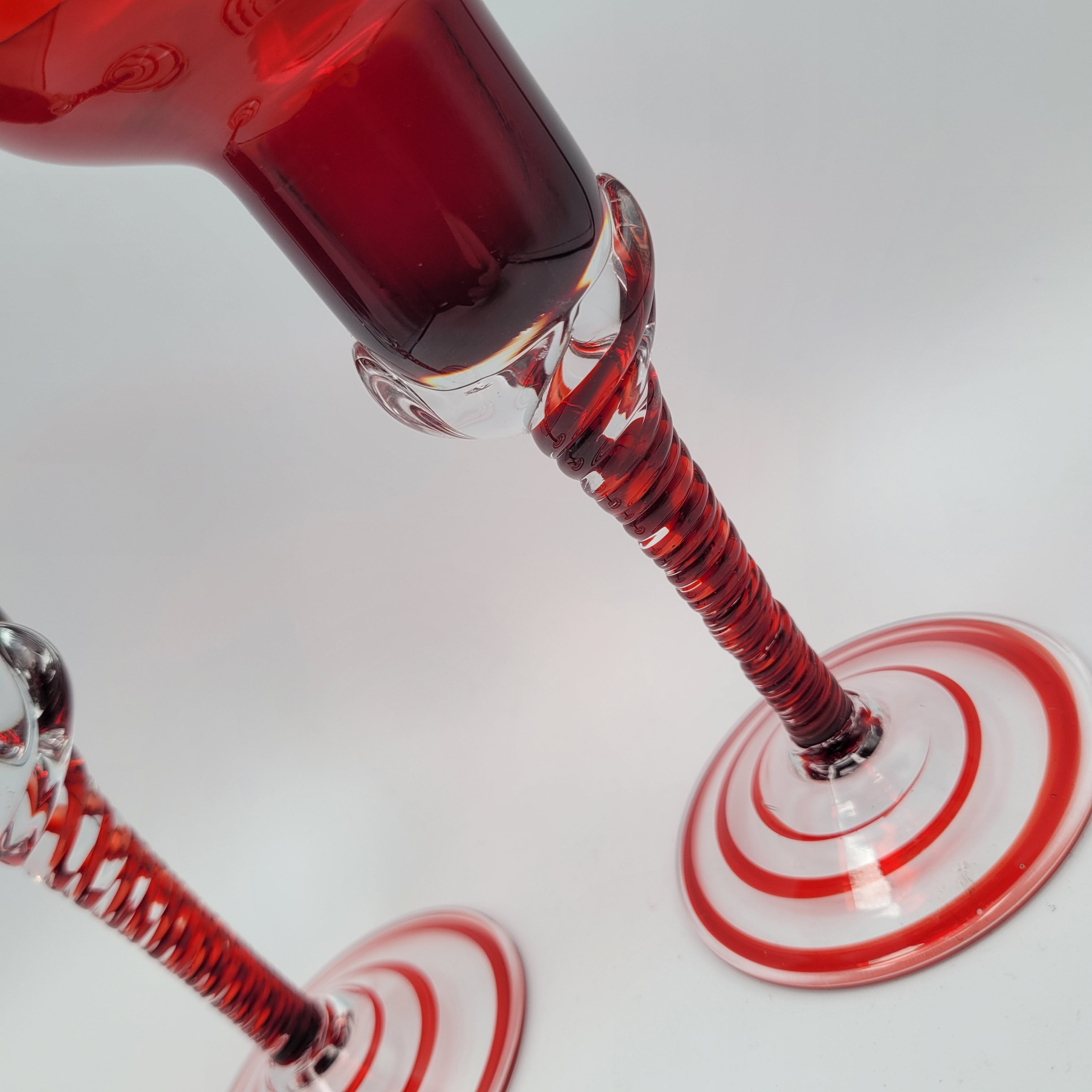 Pair of Polish hand-blown, Ruby glass, twisted stem  candleholders.1960s/70s MCM