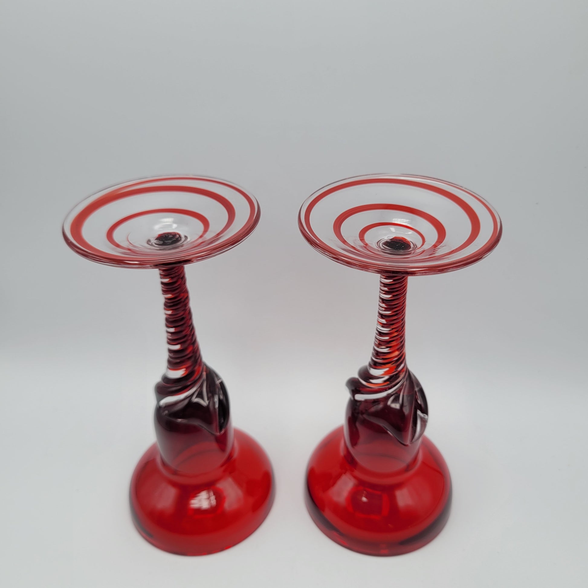 Pair of Polish hand-blown, Ruby glass, twisted stem  candleholders.1960s/70s MCM