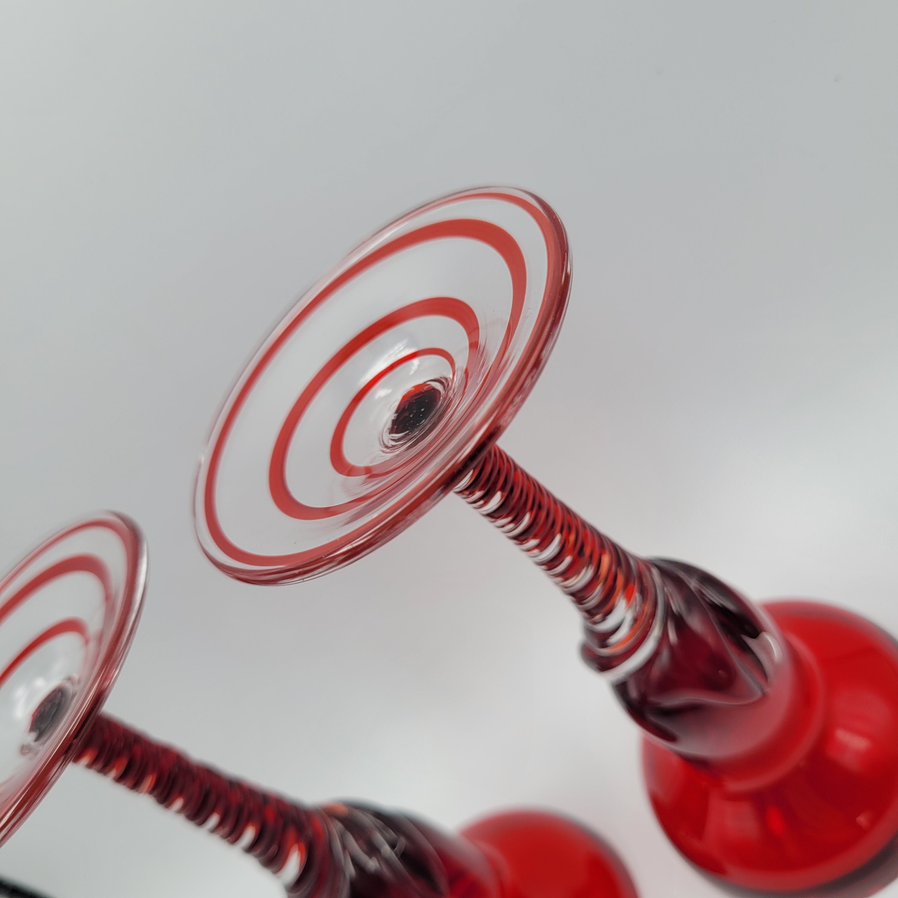 Pair of Polish hand-blown, Ruby glass, twisted stem  candleholders.1960s/70s MCM