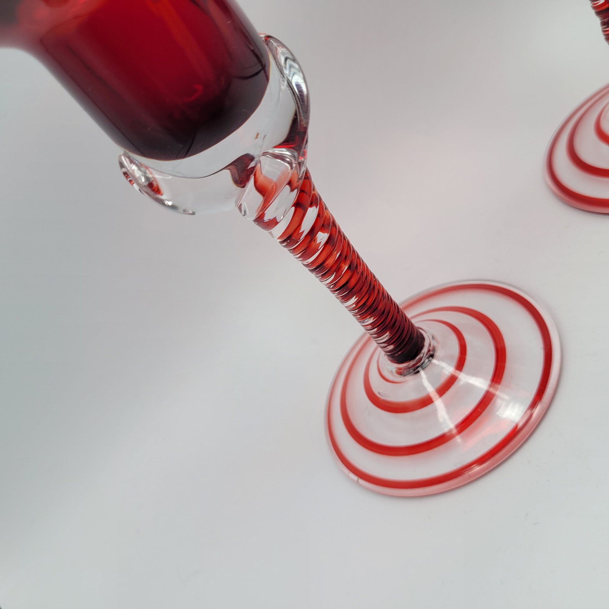 Pair of Polish hand-blown, Ruby glass, twisted stem  candleholders.1960s/70s MCM