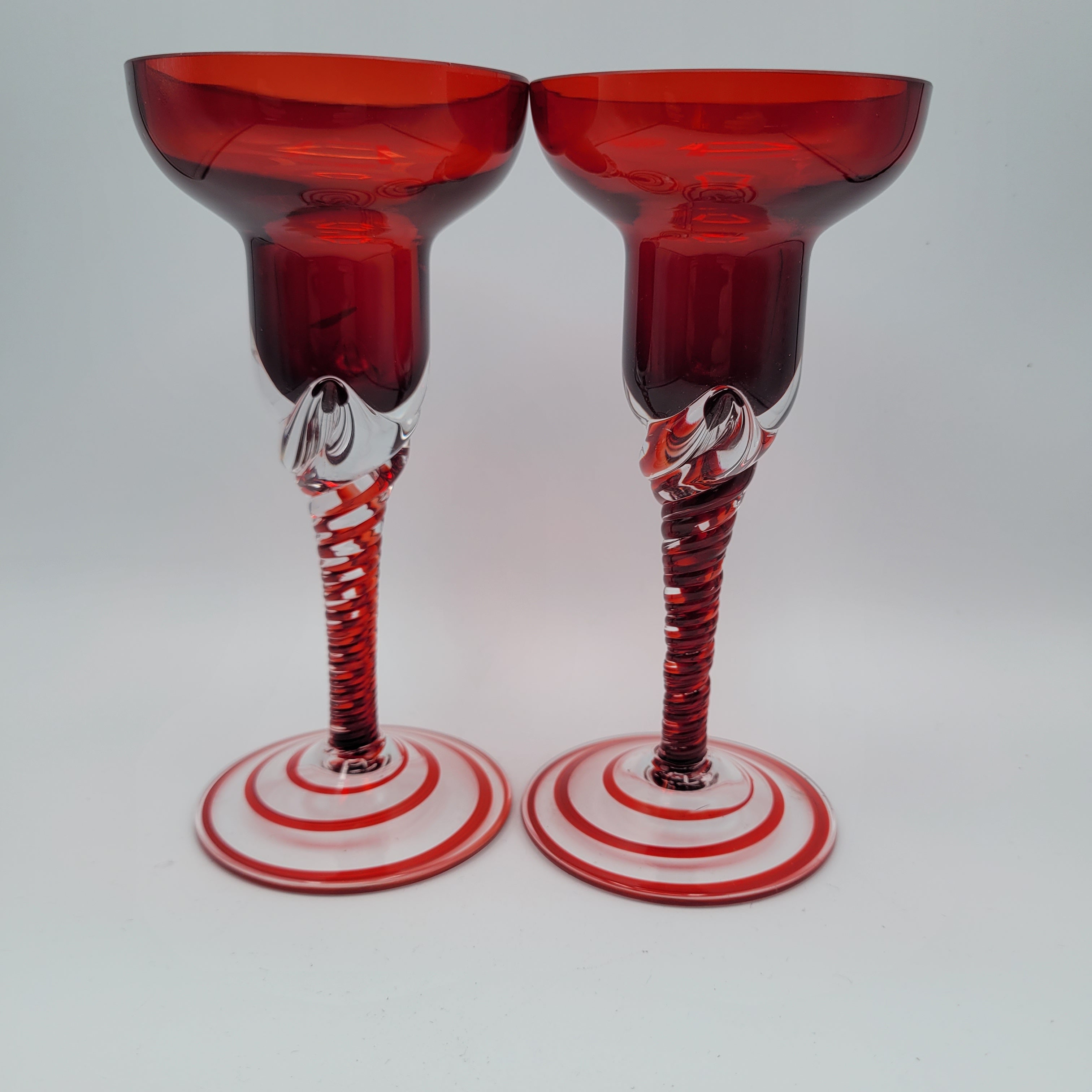 Pair of Polish hand-blown, Ruby glass, twisted stem  candleholders.1960s/70s MCM